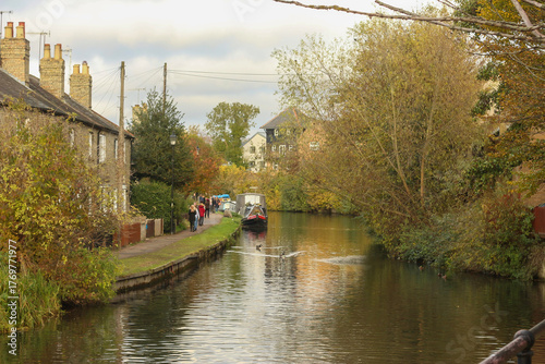 Watching on from the banks of the river Lea while it supports ducks, geese, swans, numerous plants as well as a boating lifestyle, while it flows through hertford just north of London