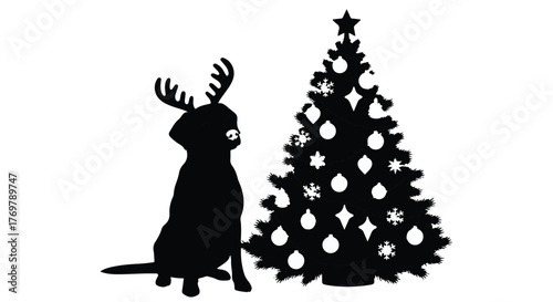 Joyful silhouette of a dog with reindeer antlers beside a decorated Christmas tree