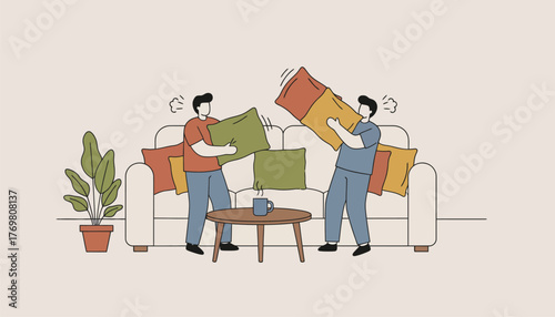 A cozy living room with cushions being fluffed and arranged on the couch creating an inviting atmosphere.