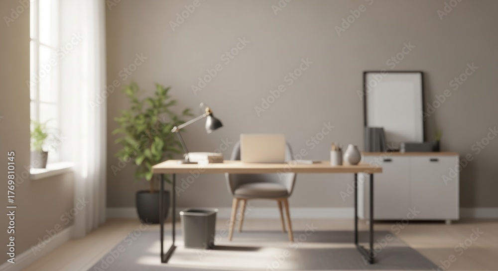 Fototapeta premium Blurred modern home office interior with desk window and plant.