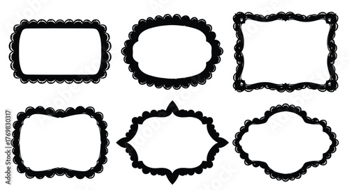 Collection of ornate black frames in various shapes and styles