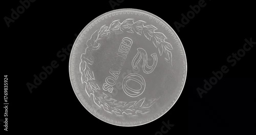 Reverse of Colombia coin 20 centavos 1970, isolated in black background. Loopable animation in 4k resolution video