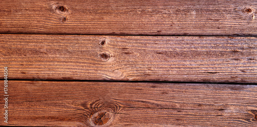 Rustic Brown Wooden Planks with Visible Grain and Knots