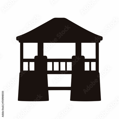 Silhouette of a traditional wooden gazebo structure, a symbol of peaceful gathering