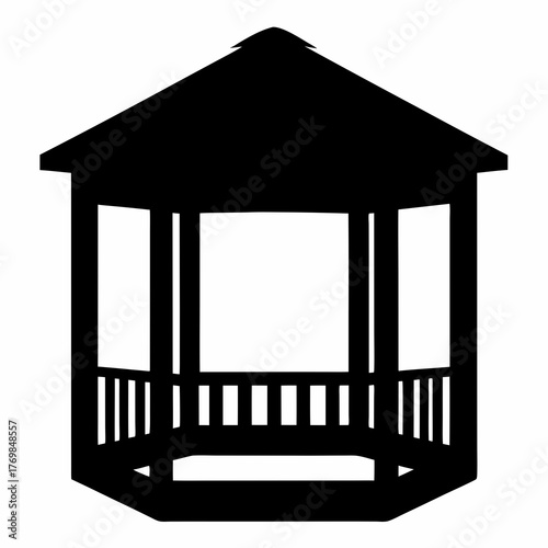 Silhouette of a classic wooden gazebo structure in a park setting
