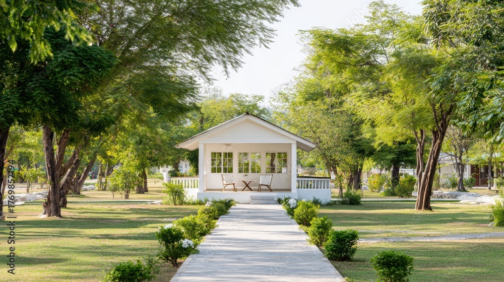 Obraz premium White Cottage Retreat: Serene Landscape and Architecture