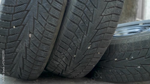 Car tires with deep tread. Rubber with deep tread ensures control in icy condition. Summer models must be replaced. Time for winter tire change. Road safety requires proper equipment