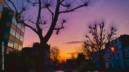 Row Houses, Low-Rise Residential Buildings, Tree-Lined Suburb Street, City Block Urban Evening View, Terraced Homes In West London At Sunset
