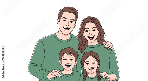 A joyful family of four, including parents and two children, smiles warmly while wearing matching green outfits, exuding happiness and togetherness in a studio portrait against a black background