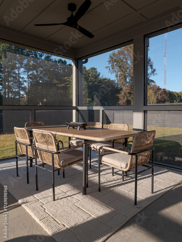 Фотография Outdoor dinning set at sunset light