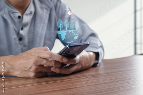 Wallpaper Mural Man Using Smartphone with Environmental Icons Illustrating Dioxide Impact Torontodigital.ca
