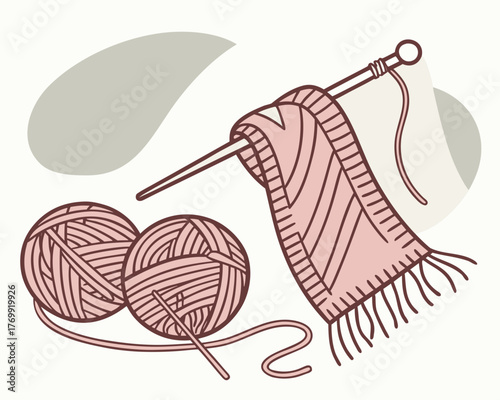 Yarn balls and knitting needle with a pink knit
