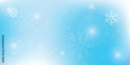Natural Winter Christmas background with blue sky, heavy snowfall, snowflakes in different shapes and forms, snowdrifts. Winter landscape with falling Christmas shining 