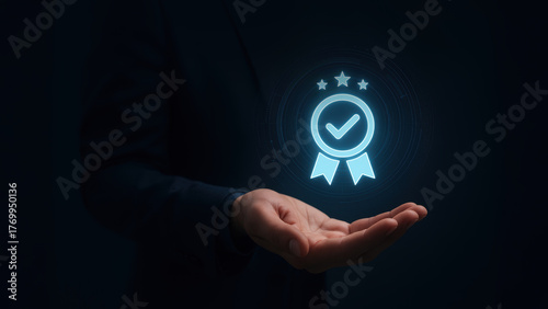 Quality badge concept compliance iso standards control seal ribbon award icon glowing above outstretched hand