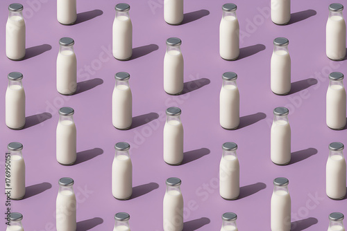 A repeating pattern of glass bottles filled with milk on a purple colored background surface