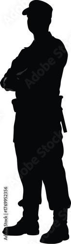 Silhouette of Military Officer with Arms Crossed and Standing Confidently in Uniform