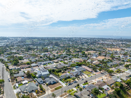 Aerial view of middle class houses in the valley of Oceanside town in San Diego, California. USA.