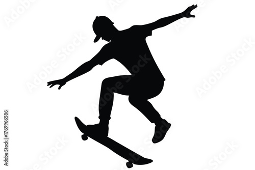 Silhouette of skateboarder performing a trick