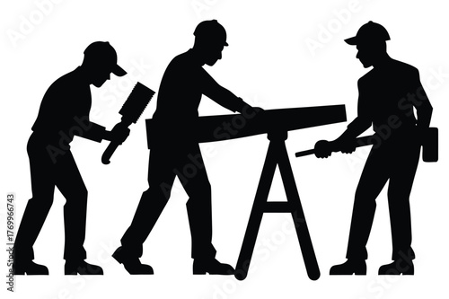 Silhouette of three construction workers working on wood