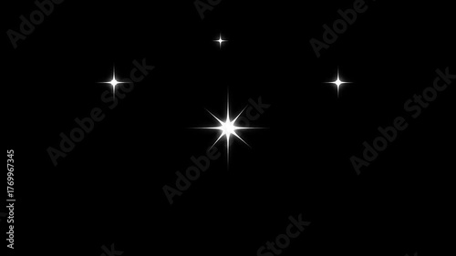 Glowing glitter burst sparkle effect overlay, twinkling glitter stars motion graphics on black screen background, shine effect glitter stars, starry night blinking and twinkling star effect. 4k video