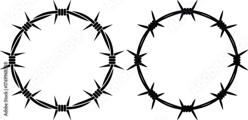 Two black barbed wire circles on white background fence security