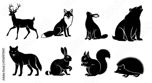 A comprehensive set of isolated black silhouette illustrations showcasing various wild forest animals, including deer, fox, bear, wolf, and rabbit, perfect for nature and wildlife design projects