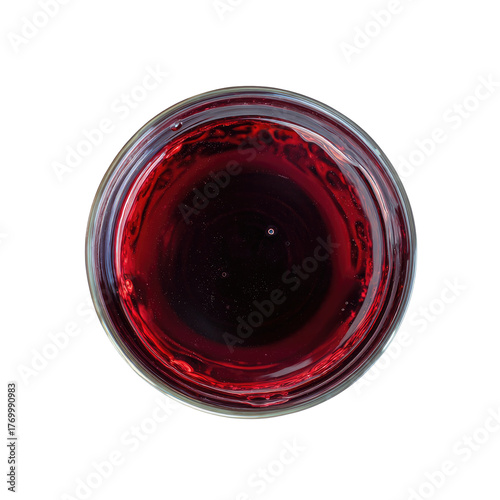 Red liquid in a glass container, seen from above against black