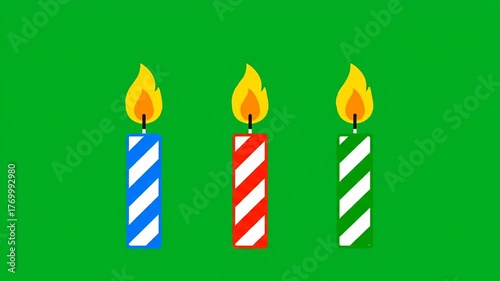 Festive birthday candles burning brightly on green background celebrate a joyous occasion