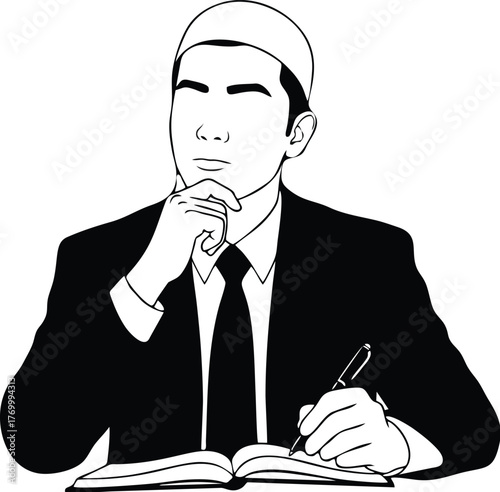 A man wearing a kufi sits at a desk, thoughtfully writing in a book with a pen.
