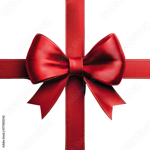 Lustrous red bow and ribbons cross on a dark surface
