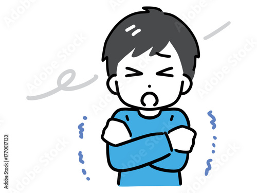 風が寒くて震えている薄着の若い男性