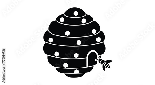 Stylized black silhouette of a beehive with a bee entering the doorway on a white background silhouette