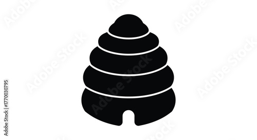 A stark black silhouette of a layered seashell with a distinct opening at the base presented on a white background silhouette