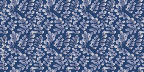 Seamless vector pattern with hand painted watercolor leaves in muted blue tones on a navy background. Organic botanical style makes it ideal for textiles, wallpapers, packaging, modern design project