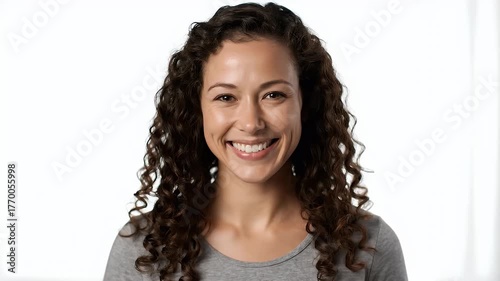 Smiling Woman with Curly Hair on White Background