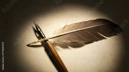 Ink pen and feather illuminated on paper