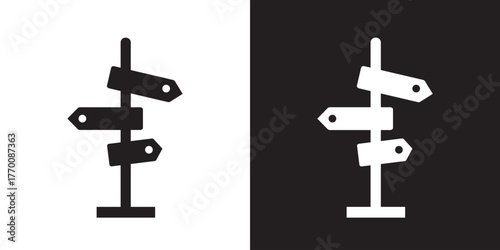 Black iconic road sign silhouette on white and black  background indicating directional choices