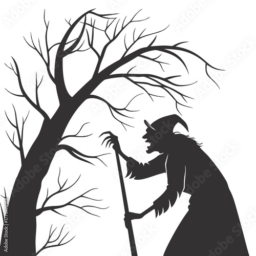 Silhouette of a spooky witch with a tree