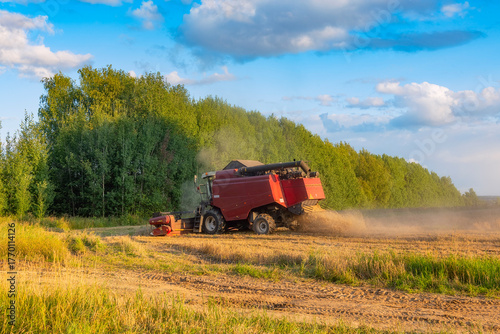 combine harvester in field