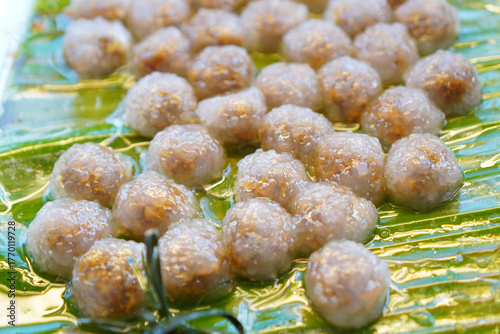 Schilderij op canvas Thai Tapioca Dumplings with Shiitake Filling on Banana Leaf