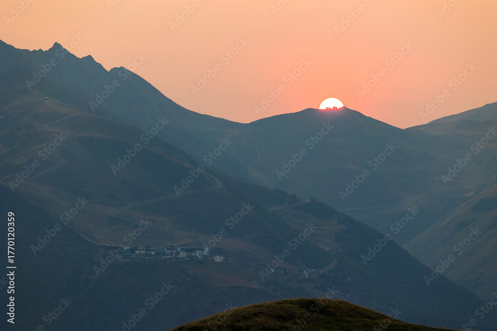 Obraz premium Summer sunset over the Pla d’Adet ski resort in Saint-Lary-Soulan seen from the Col d’Azet
