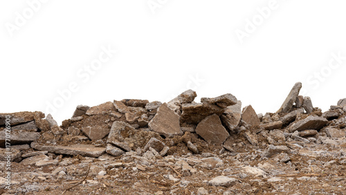 Close-up low angle view isolate of concrete debris, removed from road demolition and dumped on the ground, commonly seen in rural Thai road construction.
