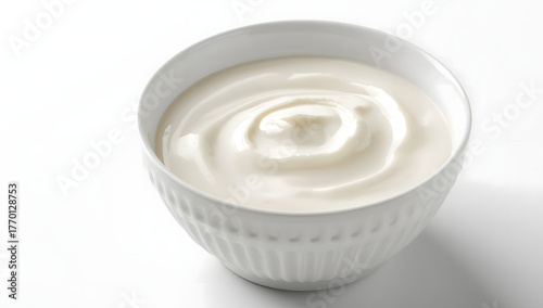 Fresh yogurt with creamy smooth texture served in a white bowl, healthy dairy food concept representing breakfast, nutrition, or natural probiotic product