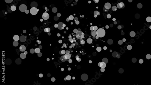 An abstract background video with animated white bokeh particles flying around a black backdrop, perfect for overlays, transitions, or digital art projects.

