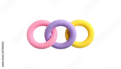 Three yarn-wrapped torus shapes, pink, lavender, and yellow, interlinked on a stark black background