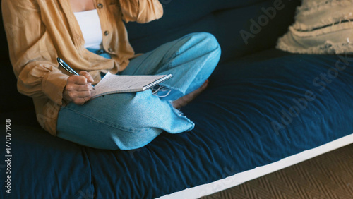 Obraz na płótnie Writing, notes and hands in lounge, creative and planning for novel on couch, inspiration and ideas
