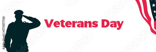 Silhouette of soldier saluting on Veterans Day with American flag