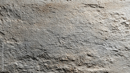 A textured stone surface, showcasing a rough, weathered aesthetic, perfect for backgrounds