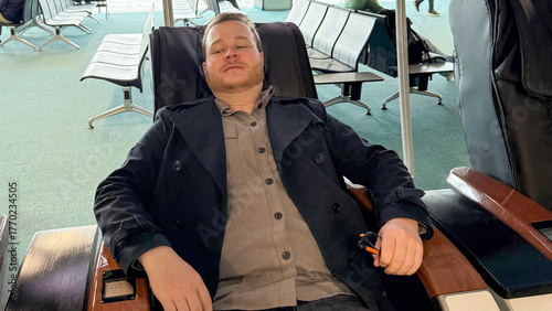 A relaxed Caucasian man in a lounge chair, capturing the serene essence of National Relaxation Day and Hygge contemplation