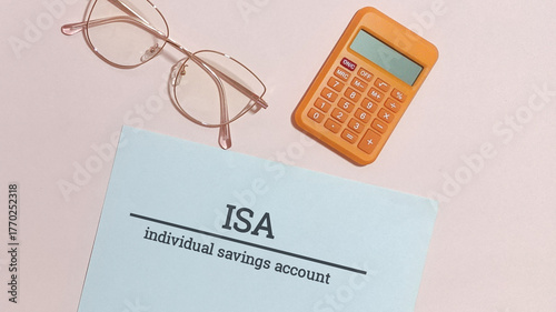 Individual Savings Account Document with Calculator and Glasses